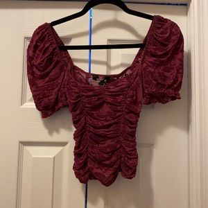 Maroon gathered crop